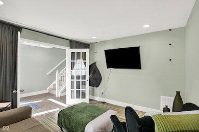 exercise area with recessed lighting and wood finished floors