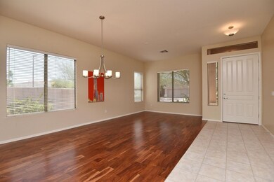 Living room w/lots of windows.