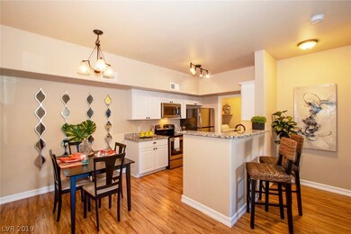 Wood-like laminate flooring with raised base board