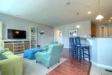 View from french doors into family room.  Notice surround sound speakers.