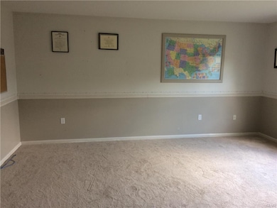Large living room with chair rail