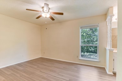 Empty room featuring light wood-style flooring, c