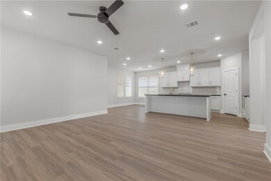 Photos are of a previous build. Floor plan is the