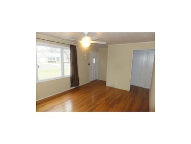 Living Room Features Hardwood Flooring