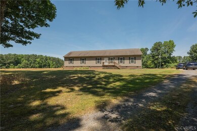 View of front of property with a front lawn