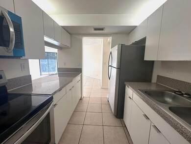 Presidential Golfview unit 2080, West Palm Beach, FL 33401 - photo 2