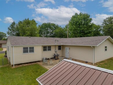Aerial view of home with 6 car garage to the right