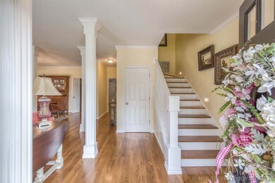 View from entryway.  Upgraded wooden stairs and lo