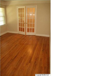 Madison, AL 35758 - Adorable full brick, 3 bedroom, 2 bath updated w/ all new vinyl windows & is move in ready. Home has tile & hardwood floors, tons of storage & french doors leading to deck w/ huge private yard