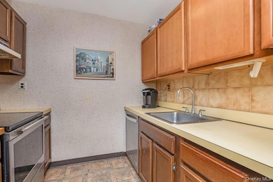 Kitchen featuring stainless steel appliances