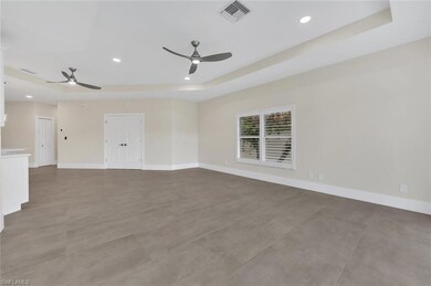 Dining and Living Rooms toward Kitchen