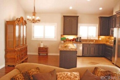 The kitchen and dining area are attached with an o