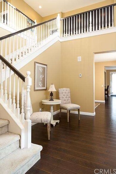 Beautiful flooring, elegant stairway.