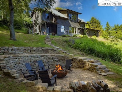 The guest cottage offers 1,366 sq ft of living space plus a 450 sq ft two-car garage—perfect for family, friends, or income potential.