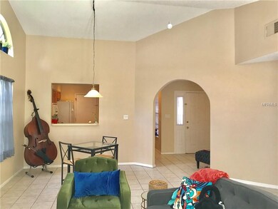 View from living area to kitchen and large foyer