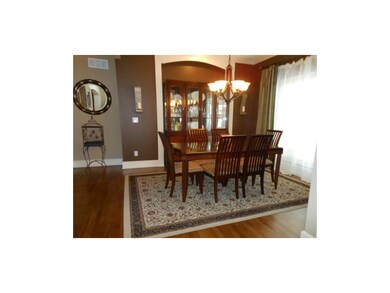 Crown molding, detailed trim, and hardwoods in din
