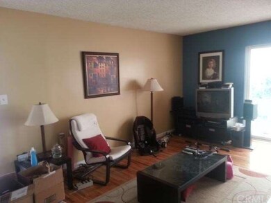 Family room with wood floors.