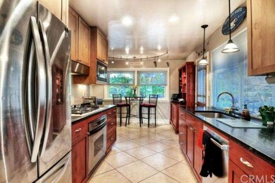 Wonderful kitchen remodel including wood cabinetry