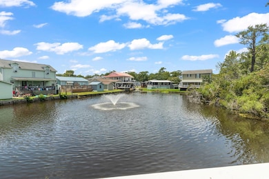 Water view with nearby suburban area