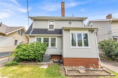 Back of property with cooling unit