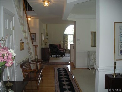 Looking towards living area of home.  Note hardwoo