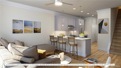 Kitchen with a kitchen breakfast bar, light hardwo