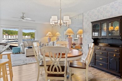 Dining Room with updated light fixture and vinyl p