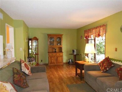 Living space with French Doors lead to patio.