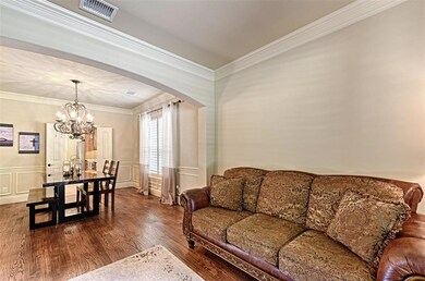 Formal living and dining areas with hand-scraped solid oak floors
