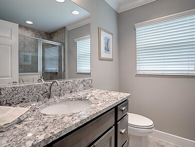 FRONT GUEST BATH WITH LARGE SHOWER AND GRANITE COU