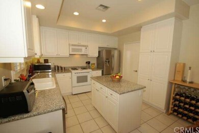 The kitchen also has direct access to the garage. 