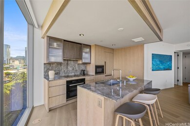 Kitchen with eat-in island seating area.