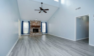 Upon entering the home, guests are greeted by soar