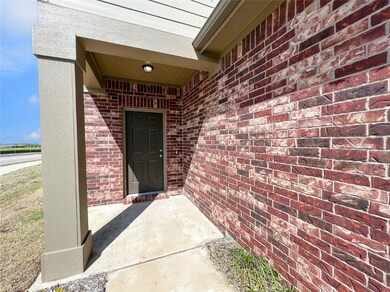 Quiet front entry on a spacious corner lot