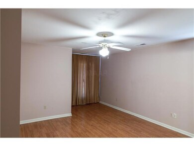 Laminate floors, nice size master bedroom.