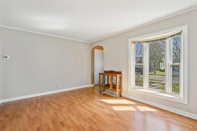 Light-filled living room with bay window