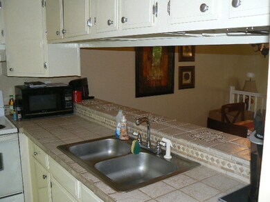 kitchen with pass thru to dining room