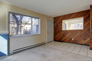 Tiled Entry with Cedar Accent Wall!