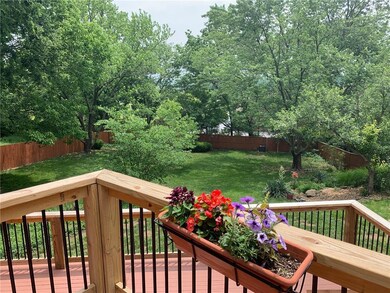 large, lush & landscaped treed yard that is truly 