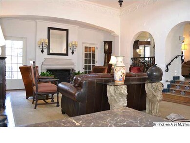 Grand Salon features limestone fireplace. From thi