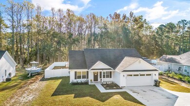 View of front of property featuring a front yard a