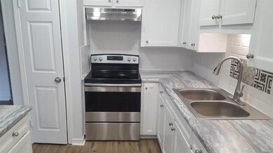 New electric and stainless steel stove vent.