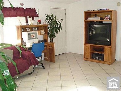 Tiled Floors in Living Room Area