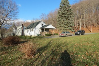 Looking at house from corner of yard