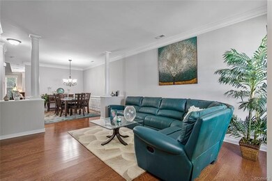 Elegant Living Room space opens to the dining room