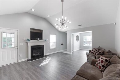 Living Room with view of eat in kitchen.