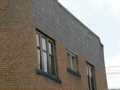 Exterior Front. UPPER BRICK HAS BEEN REBUILT IN TH
