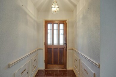 Beautiful wood door with leaded glass inserts, wit