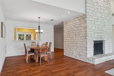 Dining area with a chandelier, visible vents, bas