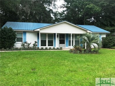 Newer metal roof, all brick home and double-paned 